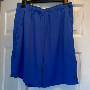 Nike men’s blue athletic shorts.